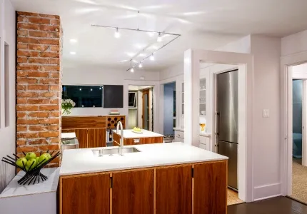 Remodeled kitchen with brick accent