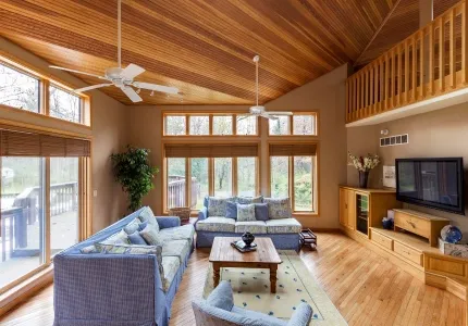 Living room with vaulted wood ceiling